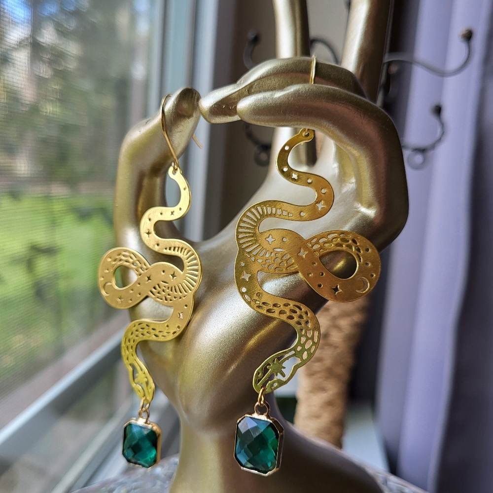 Goldtone serpent earrings with Green stone